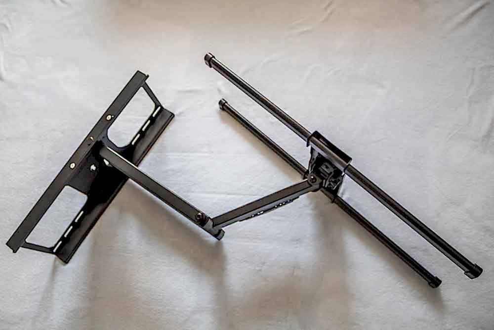 Single arm full motion TV wall mount with the arm extended from the wall plate